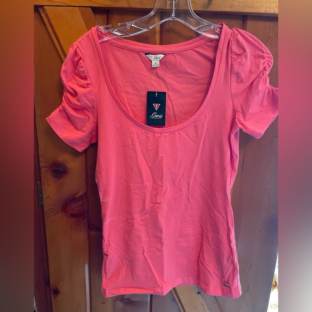 Guess women’s blouse/top. Medium. Salmon pink color. New with tags